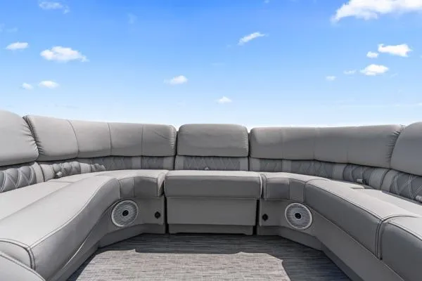Slide: The Image of Luxurious seating on 2023 Bennington QX 25 QXSBA pontoon boat under blue sky. - 5