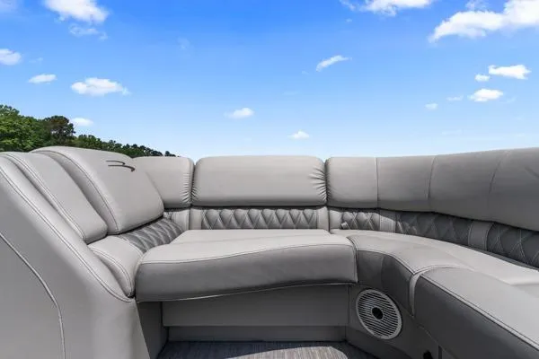 Slide: The Image of Luxurious seating on 2023 Bennington QX 25 QXSBA pontoon boat under blue sky. - 6
