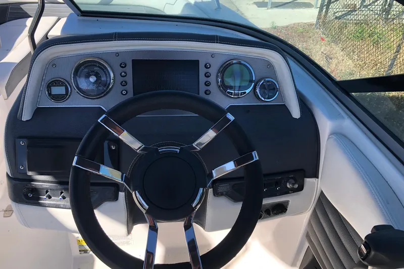 Slide: The Image of Steering wheel and dashboard of 2017 Regal 24 FasDeck boat. - 6