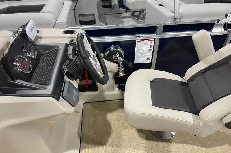 Slide: The Image of Captain's seat and helm of 2026 Harris Cruiser 210 SL pontoon boat. - 5