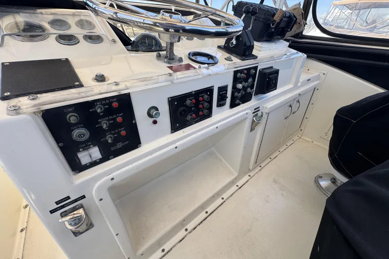 Slide: The Image of Control panel of a 1985 Hatteras 45 Convertible yacht cockpit. - 16
