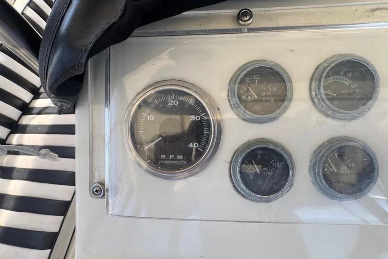 Slide: The Image of Dashboard gauges of a 1985 Hatteras 45 Convertible boat. - 20