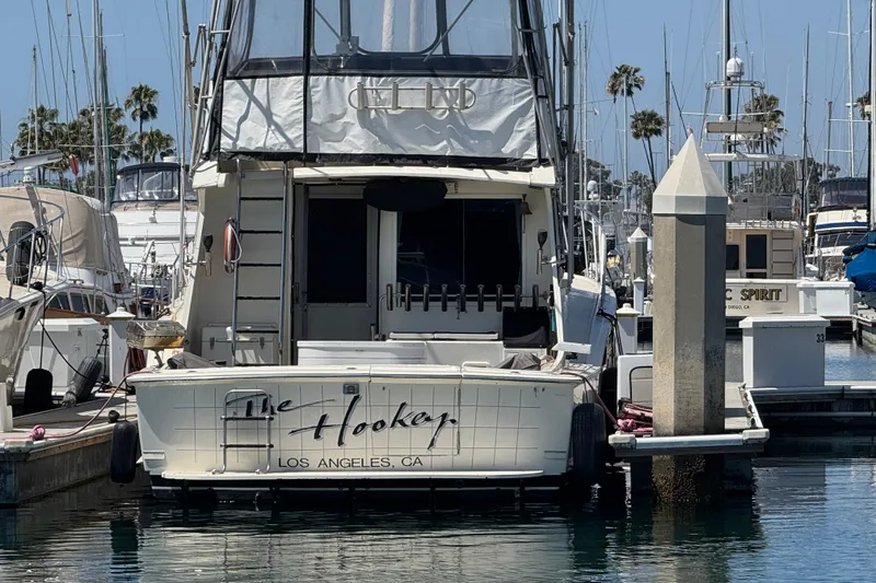 Slide: The Image of 1985 Hatteras 45 Convertible yacht docked in a marina, Los Angeles, CA. - 4