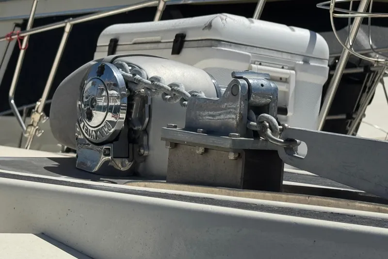Slide: The Image of Anchor winch on 1985 Hatteras 45 Convertible boat deck, close-up view. - 5