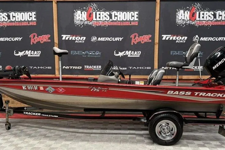The Image of 2007 Tracker Pro Team 175 TXW bass boat on display at Angler's Choice showroom. - 0