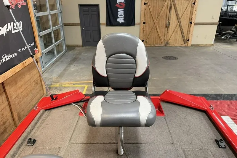 Slide: The Image of 2007 Tracker Pro Team 175 TXW boat seat in a garage setting. - 3