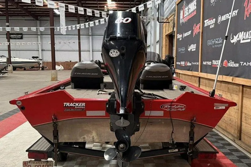 Slide: The Image of 2007 Tracker Pro Team 175 TXW boat with 60 HP engine in showroom. - 4