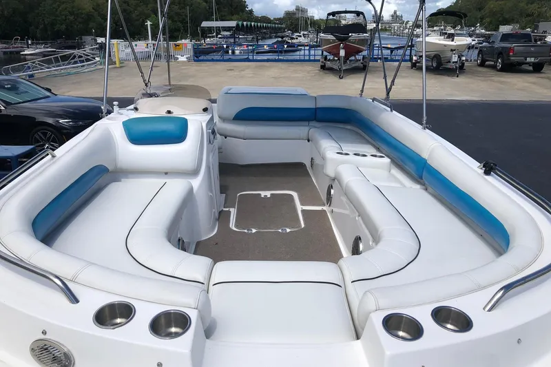 Slide: The Image of 2014 Hurricane SunDeck Sport 201 IO boat with spacious seating and cup holders. - 12