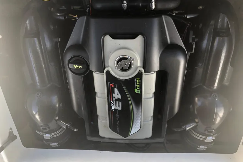Slide: The Image of Engine of 2014 Hurricane SunDeck Sport 201 IO boat, featuring 4.3 MPI MerCruiser. - 6