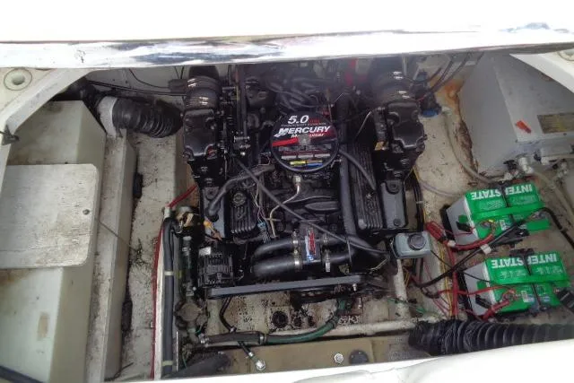 Slide: The Image of Engine compartment of a 2000 Bayliner 2455 Ciera Sunbridge with a 5.0 Mercury engine. - 35