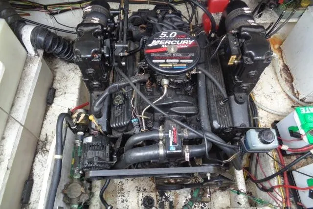 Slide: The Image of Engine compartment of a 2000 Bayliner 2455 Ciera Sunbridge with a 5.0 Mercury engine. - 36