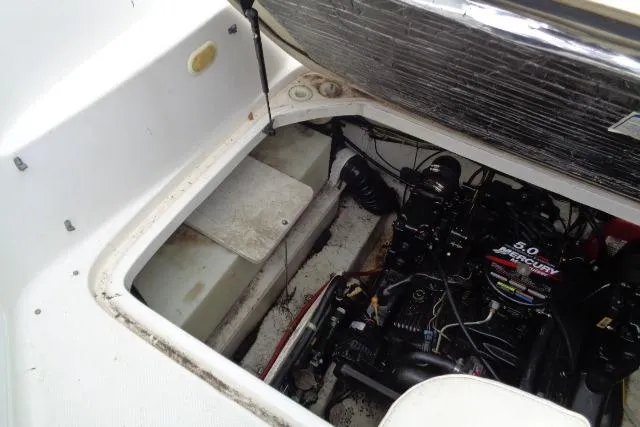 Slide: The Image of Engine compartment of a 2000 Bayliner 2455 Ciera Sunbridge with a 5.0 Mercury engine. - 37