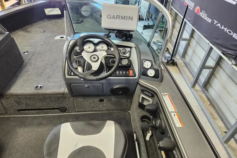 Slide: The Image of Interior of a 2011 Lund 1975 Pro-V SE boat with Garmin navigation system. - 5