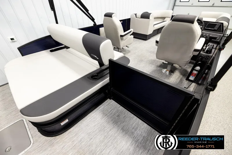 Slide: The Image of 2026 Bennington 22 SSBSF pontoon boat interior with modern seating and control panel. - 12
