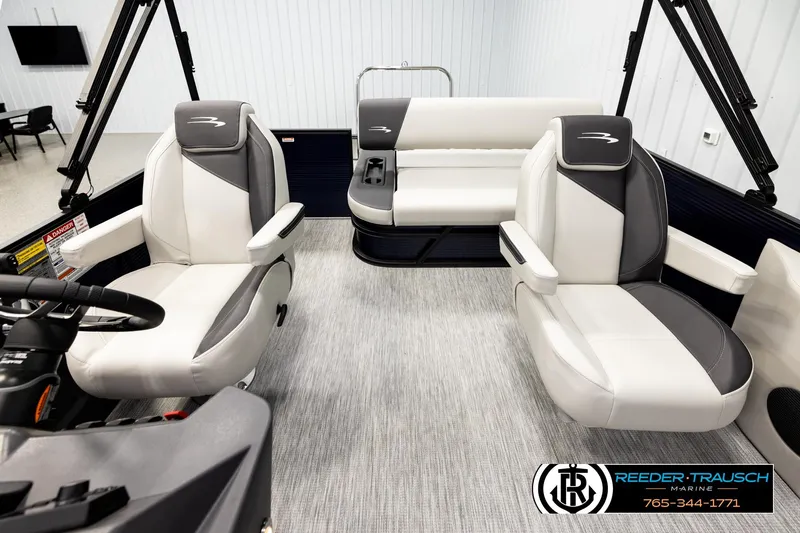 Slide: The Image of Interior of 2026 Bennington 22 SSBSF pontoon boat with plush seating and modern design. - 14