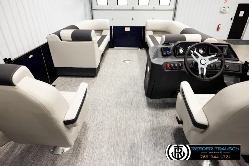 Slide: The Image of Interior of 2026 Bennington 22 SSBSF pontoon boat with modern seating and steering console. - 17