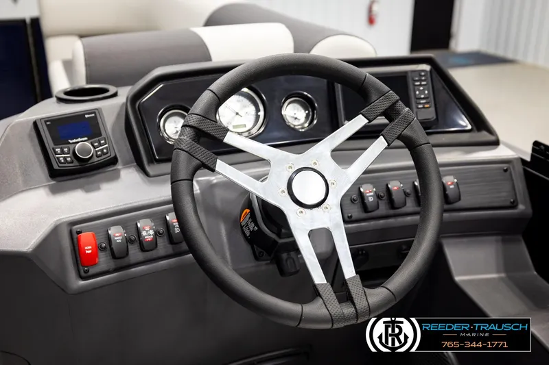 Slide: The Image of Steering console of 2026 Bennington 22 SSBSF boat with controls and gauges. - 30