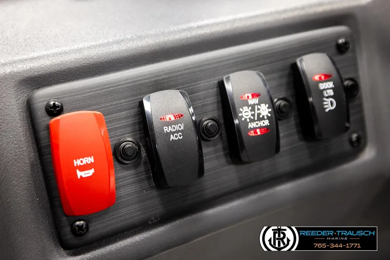 Slide: The Image of Control panel of a 2026 Bennington 22 SSBSF boat with labeled switches. - 32