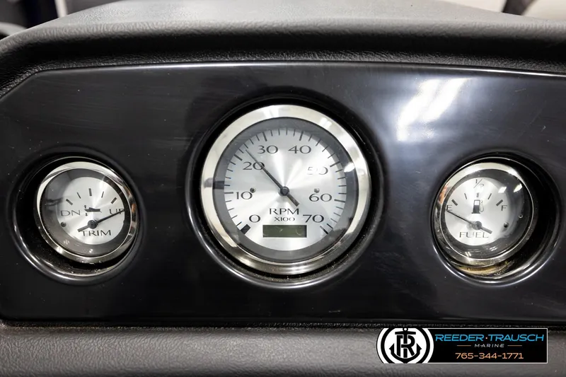 Slide: The Image of Dashboard gauges of a 2026 Bennington 22 SSBSF boat, featuring RPM, trim, and fuel indicators. - 34