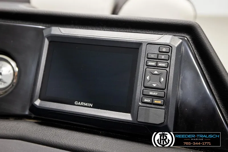 Slide: The Image of Garmin display on 2026 Bennington 22 SSBSF boat dashboard, featuring control buttons. - 35