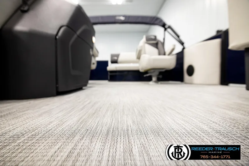 Slide: The Image of Interior view of 2026 Bennington 22 SSBSF pontoon boat with modern seating and flooring. - 48