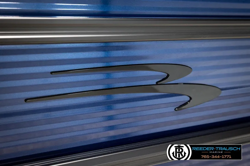 Slide: The Image of 2026 Bennington 22 SSBSF boat logo on blue metallic surface. - 49