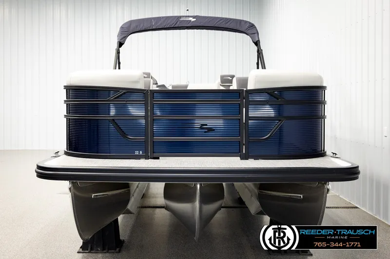 Slide: The Image of 2026 Bennington 22 SSBSF pontoon boat in showroom, front view. - 8