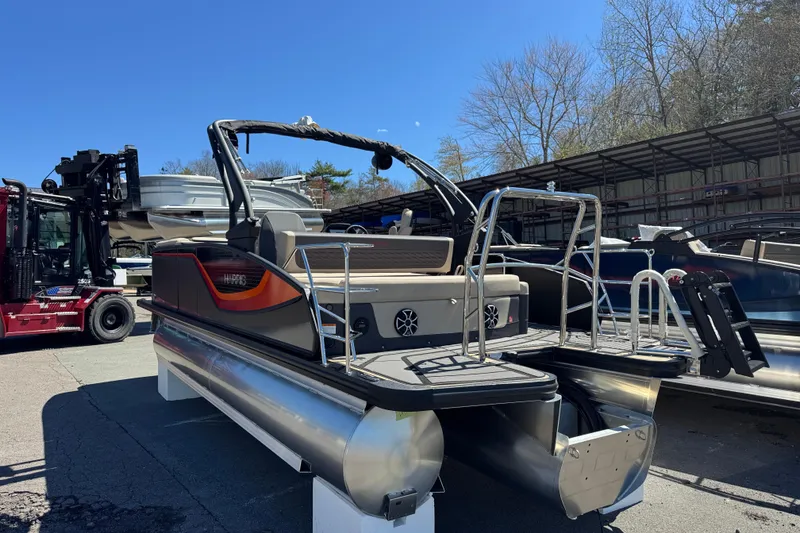 Slide: The Image of 2026 Harris Sunliner 230 Sport pontoon boat on display, featuring sleek design and modern amenities. - 6