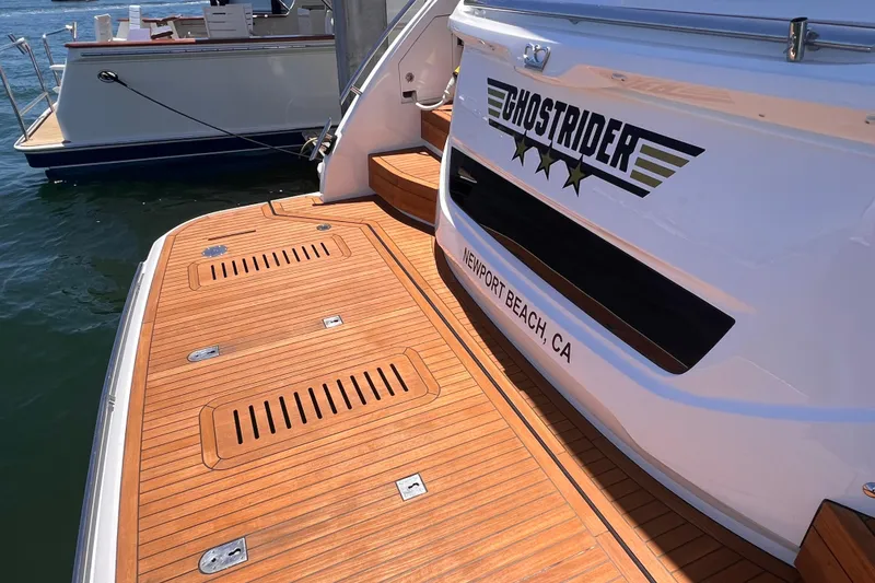 Slide: The Image of Luxury yacht "Ghostrider" docked, featuring teak deck, Newport Beach, Princess F55, 2019 model. - 29
