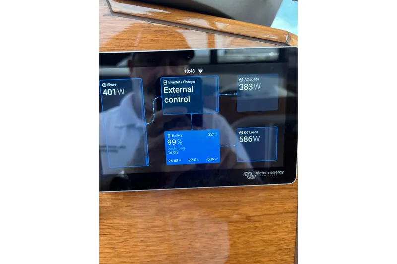 Slide: The Image of Touchscreen display on 2019 Princess F55 yacht showing power management details. - 53