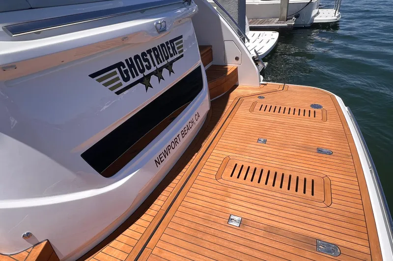 Slide: The Image of 2019 Princess F55 yacht with teak deck, "Ghostrider" name, Newport Beach, CA. - 28