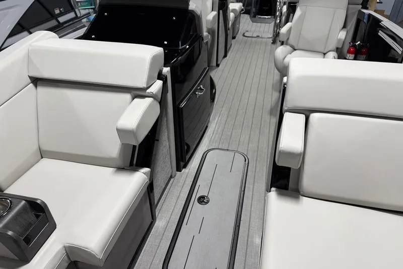 Slide: The Image of Luxurious interior of 2025 Balise Horizon 24 boat with white seating and sleek design. - 12