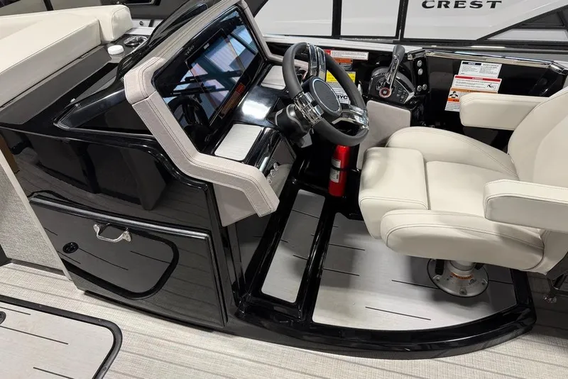Slide: The Image of Luxurious interior of 2025 Balise Horizon 24 boat with modern steering console. - 16