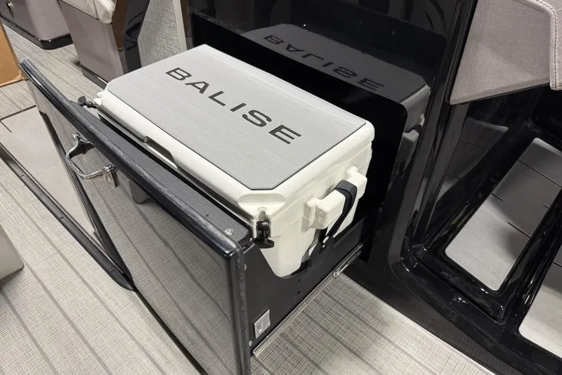 Slide: The Image of Built-in cooler in 2025 Balise Horizon 24 boat, featuring sleek design and storage. - 17