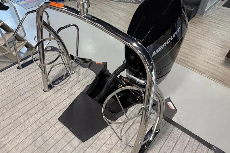 Slide: The Image of Rear view of 2025 Balise Horizon 24 boat with Mercury outboard motor. - 22