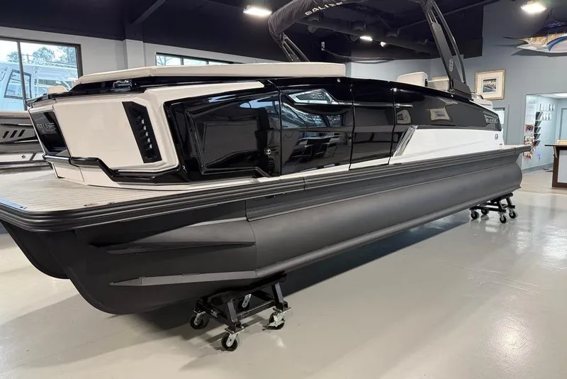 Slide: The Image of 2025 Balise Horizon 24 boat displayed indoors, showcasing sleek design and modern features. - 3