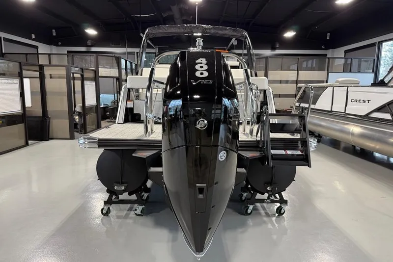 Slide: The Image of 2025 Balise Horizon 24 boat with powerful 400 HP engine in showroom. - 5