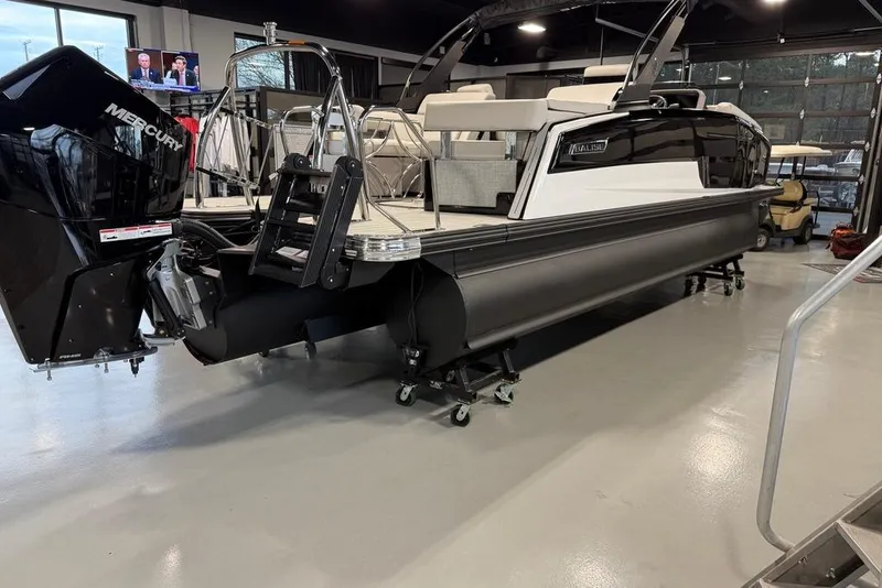 Slide: The Image of 2025 Balise Horizon 24 pontoon boat with Mercury engine in showroom. - 6
