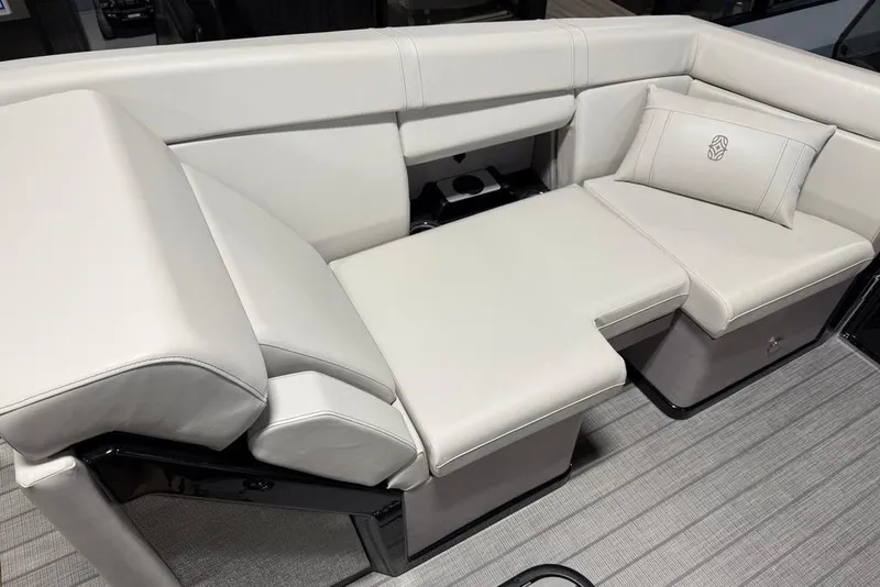 Slide: The Image of Luxurious seating area on 2025 Balise Horizon 24 boat, featuring plush white upholstery. - 9