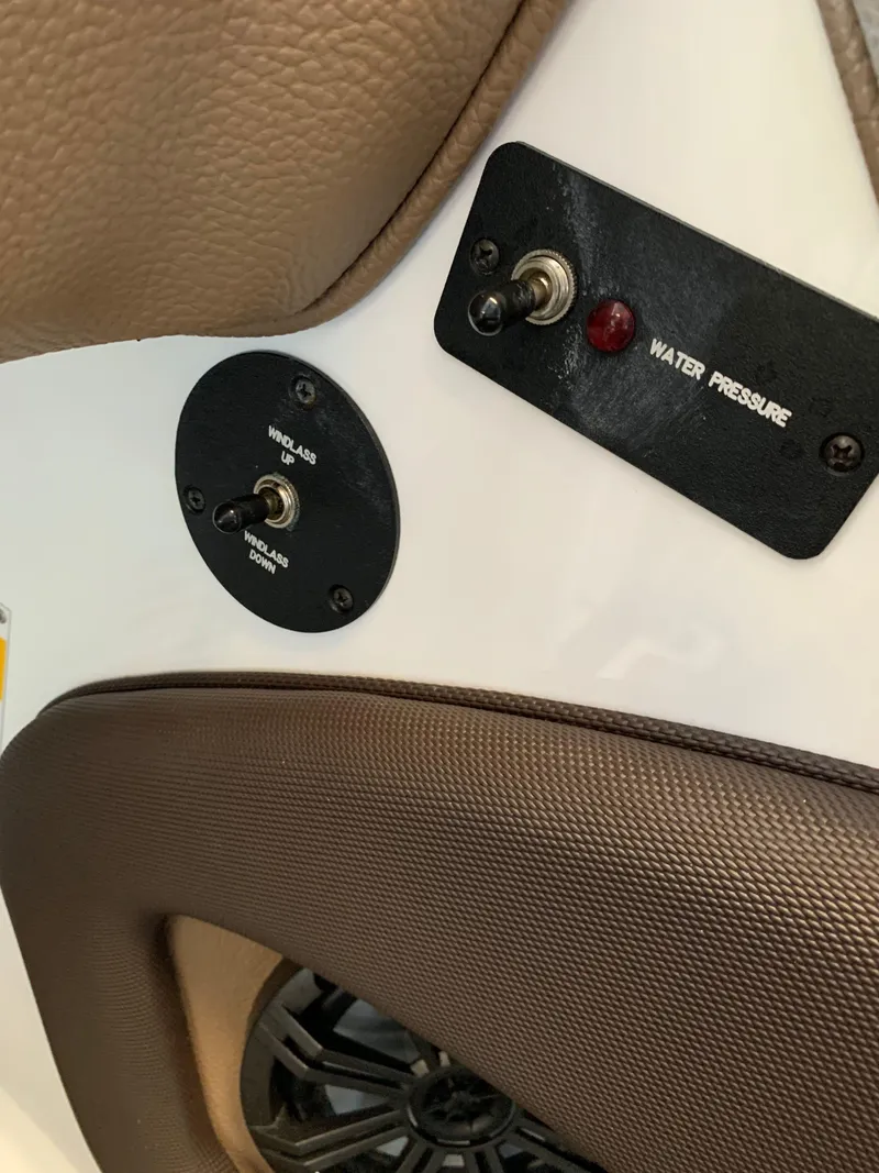 Slide: The Image of Control panel of a 2015 Cobalt 243 boat. - 26