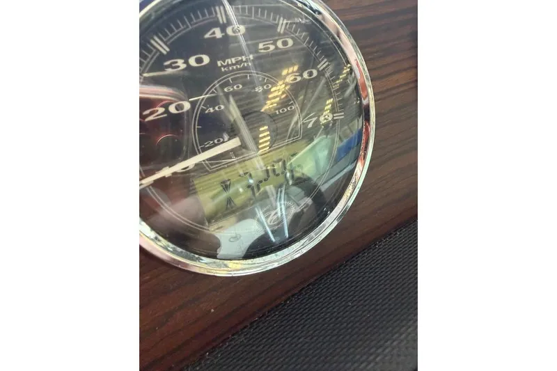 Slide: The Image of Close-up of a 2015 Cobalt 243 speedometer, displaying speed in MPH and KM/H. - 28