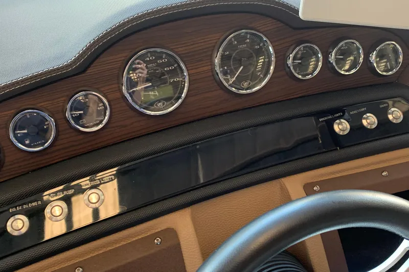 Slide: The Image of Dashboard of 2015 Cobalt 243 boat with gauges - 31