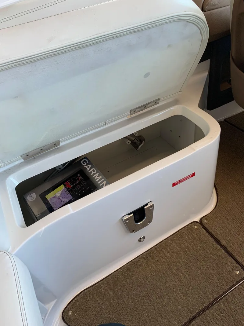 Slide: The Image of Storage compartment in 2015 Cobalt 243 boat. - 38