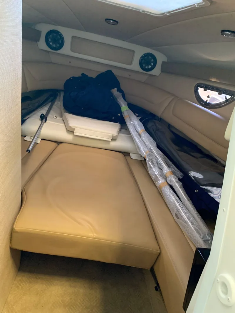 Slide: The Image of Interior of a 2015 Cobalt 243 boat with seating area. - 47