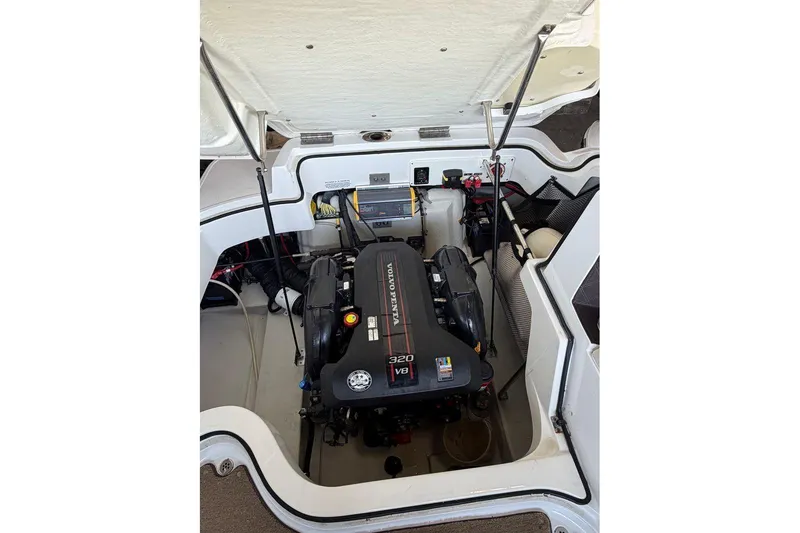 Slide: The Image of Engine compartment of a 2015 Cobalt 243 boat with Volvo Penta 320 V8 engine. - 53