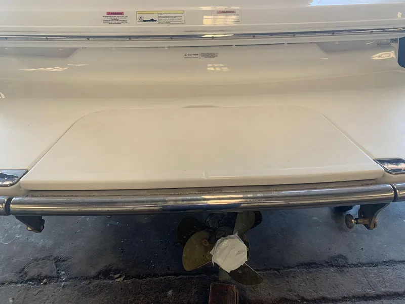 Slide: The Image of Rear view of a 2015 Cobalt 243 boat with propeller. - 6