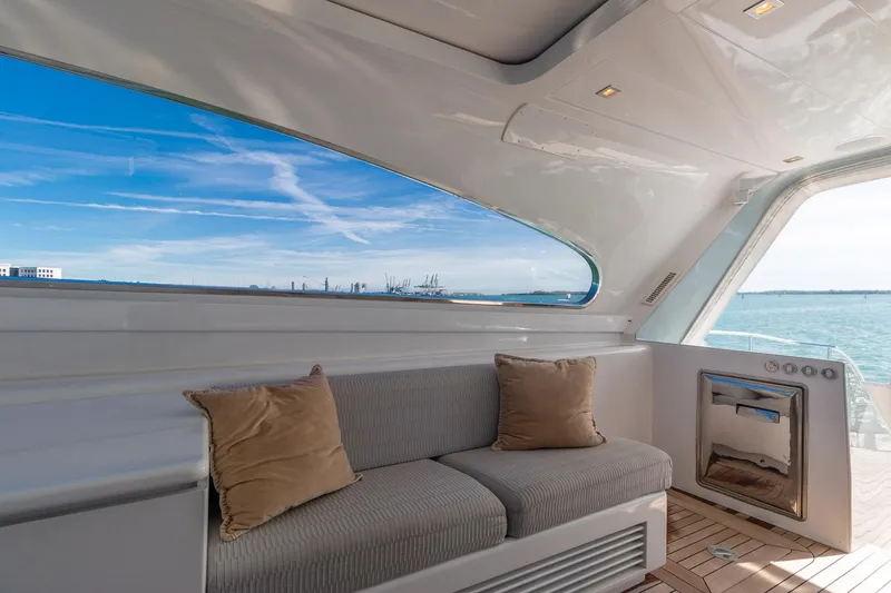 Slide: The Image of Luxurious 2007 Leopard Express Motor Yacht interior with ocean view and plush seating. - 14
