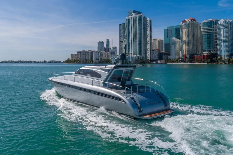 Slide: The Image of 2007 Leopard Express Motor Yacht cruising near city skyline on a sunny day. - 3