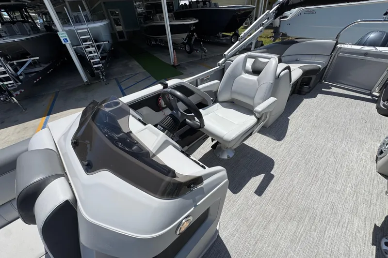 Slide: The Image of Interior of 2021 Avalon LSZ 2485 QL pontoon boat with modern seating and helm. - 22