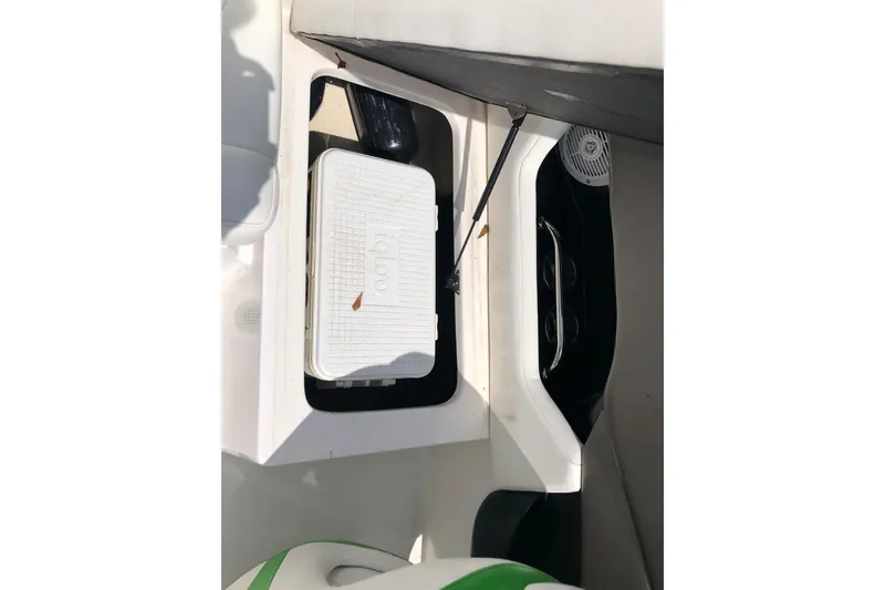 Slide: The Image of 2008 Regal 2000 Bowrider interior with storage compartment and cooler. - 18
